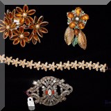 J152. Amber colored costume jewelry.